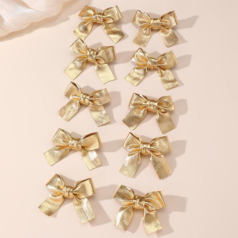 Gold and Silver Bow Hair Clips - Tie Clip Silver recension och pris